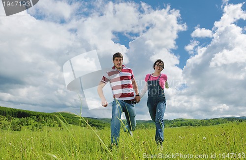 Image of romantic young couple in love together outdoor