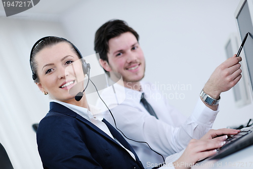 Image of business people group working in customer and help desk office