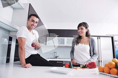 Image of young couple have fun in modern kitchen