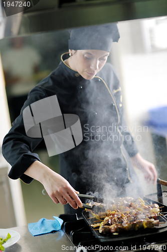 Image of chef preparing meal