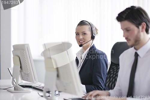 Image of business people group working in customer and help desk office