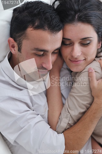 Image of happy young couple relax at home
