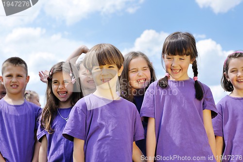 Image of happy kids group  have fun in nature