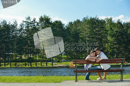 Image of romantic young couple in love together outdoor