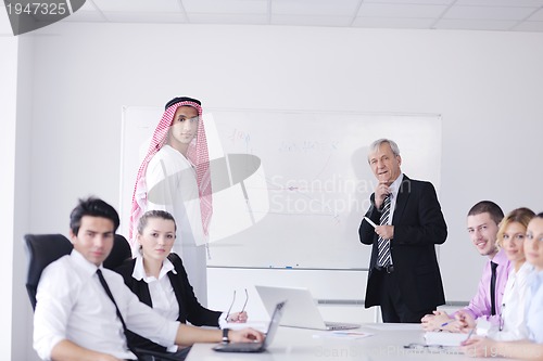 Image of Arabic business man at meeting