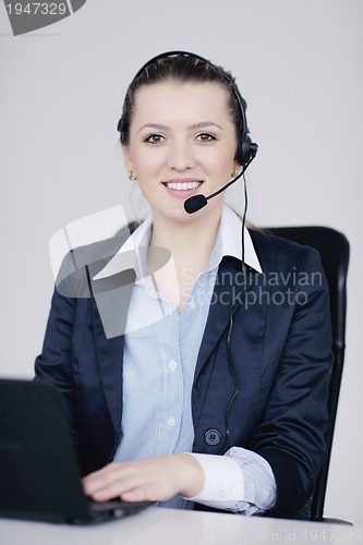 Image of business woman group with headphones