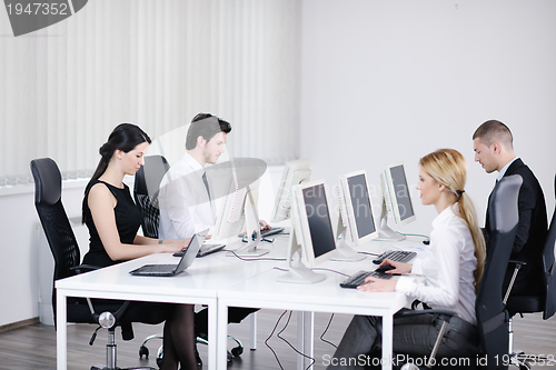 Image of business people group working in customer and help desk office