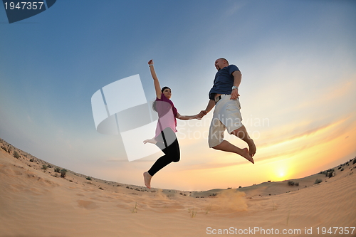 Image of couple enjoying the sunset