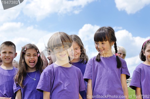 Image of happy kids group  have fun in nature