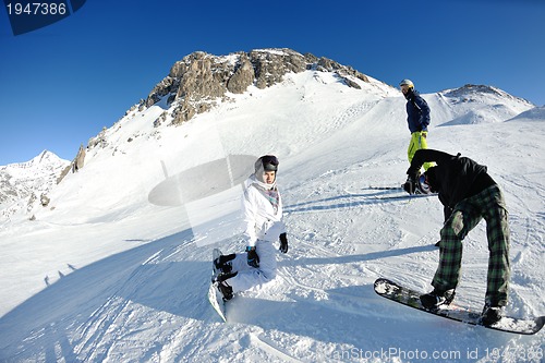 Image of winter portrait of friends at skiing