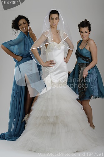 Image of portrait of a three beautiful woman in wedding dress