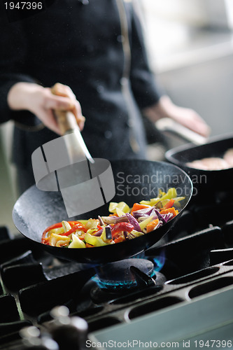 Image of chef preparing meal