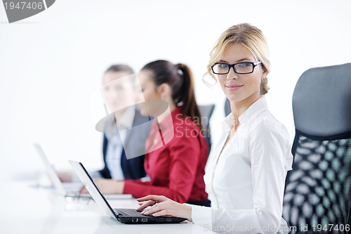 Image of business woman group with headphones