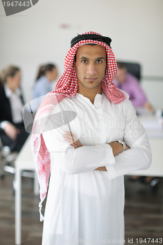 Image of Arabic business man at meeting