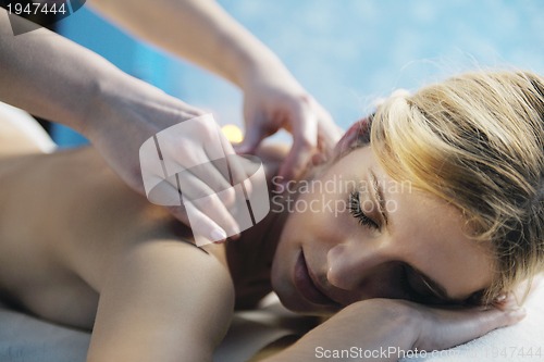 Image of Beautiful young woman in spa