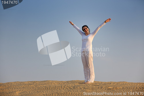 Image of woman relax in desert