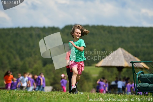 Image of happy kids group  have fun in nature
