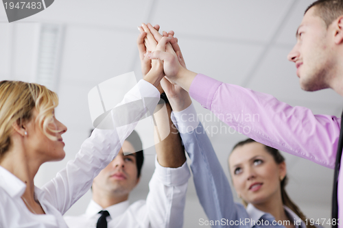 Image of business people group joining hands