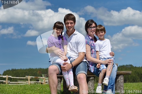 Image of happy young family have fun outdoors