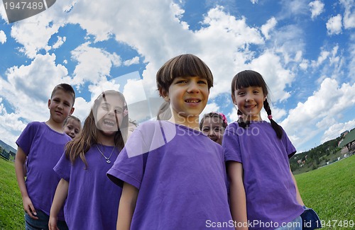 Image of happy kids group  have fun in nature