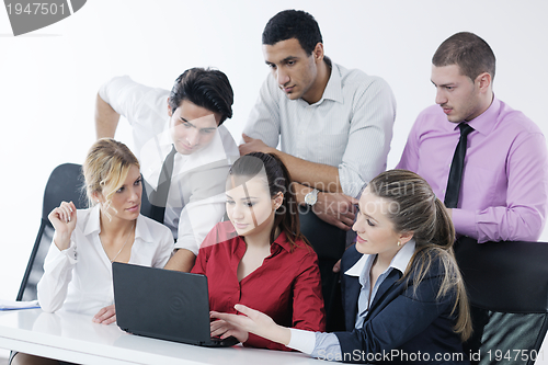 Image of Group of young business people at meeting