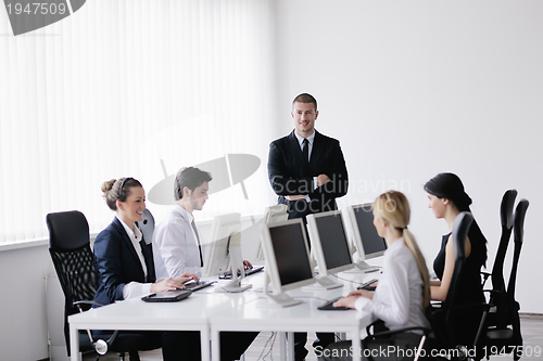 Image of business people group working in customer and help desk office