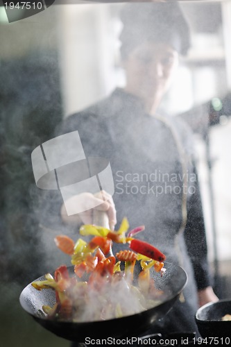 Image of chef preparing meal