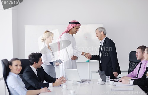 Image of Arabic business man at meeting