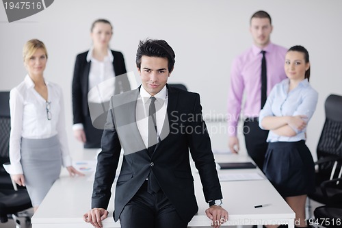 Image of young business man at meeting