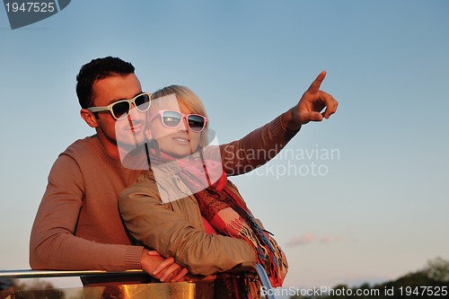 Image of couple in love  have romantic time on boat