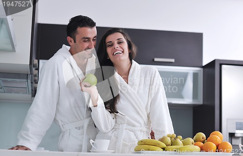 Image of young couple have fun in modern kitchen