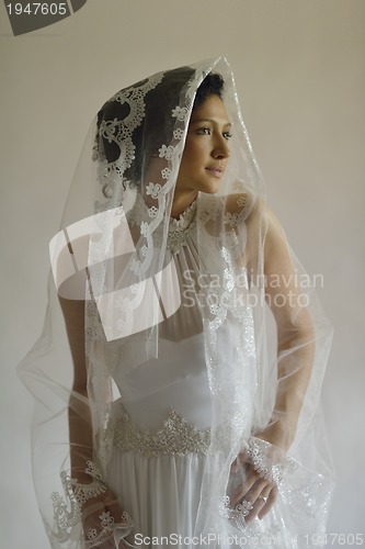 Image of Portrait of a beautiful woman dressed as a bride