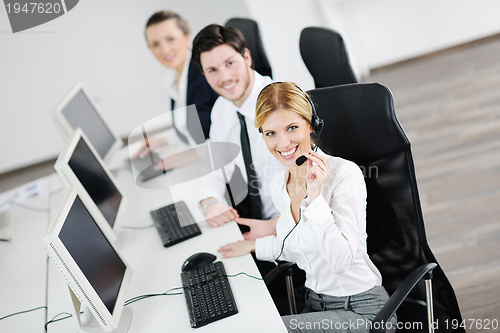 Image of business people group working in customer and help desk office