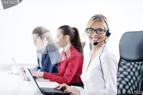 Image of business woman group with headphones