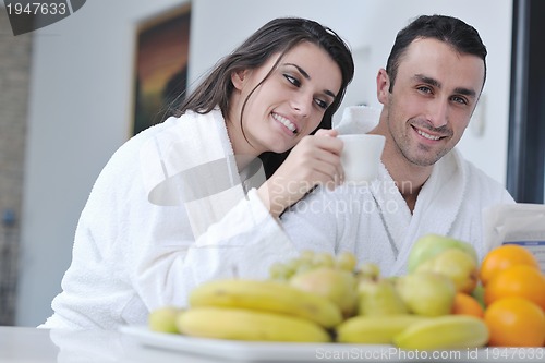 Image of young couple have fun in modern kitchen
