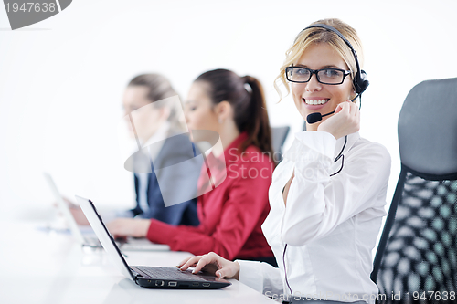 Image of business woman group with headphones