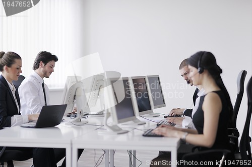 Image of business people group working in customer and help desk office