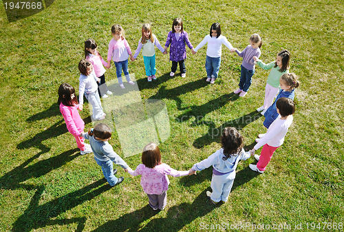 Image of preschool  kids outdoor have fun