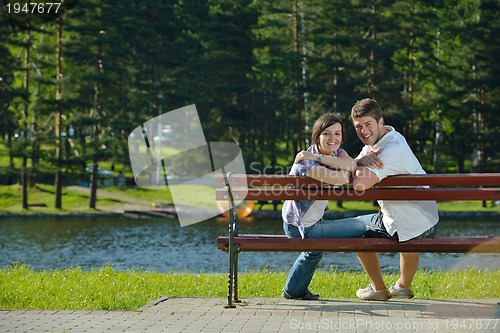 Image of romantic young couple in love together outdoor