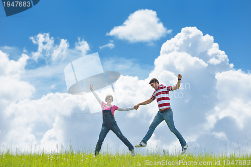 Image of romantic young couple in love together outdoor