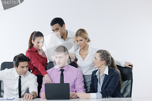 Image of Group of young business people at meeting