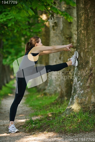 Image of woman stretching before fitness