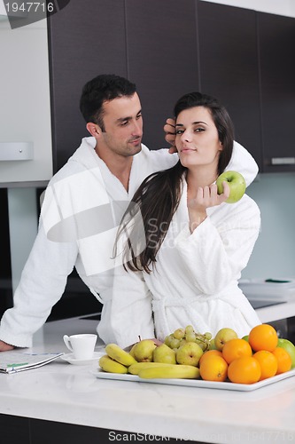 Image of young couple have fun in modern kitchen