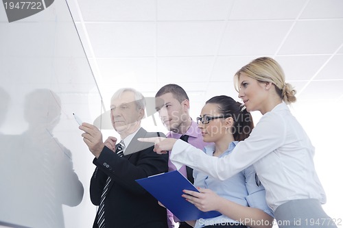 Image of Senior business man giving a presentation