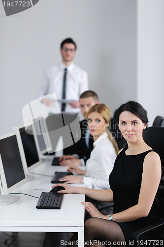 Image of business people group working in customer and help desk office