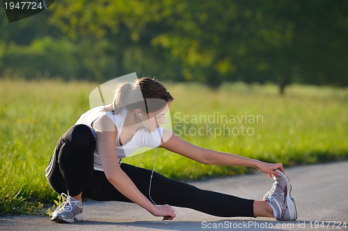 Image of woman stretching before fitness