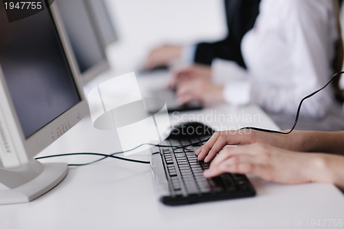 Image of business people group working in customer and helpdesk office