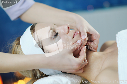 Image of Beautiful young woman in spa