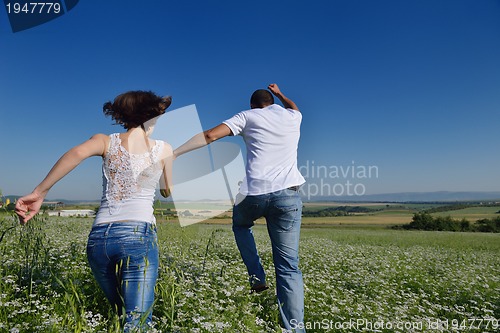 Image of happy couple in wheat field