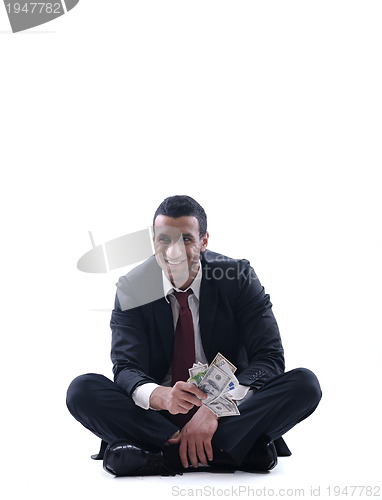 Image of Business man holding money